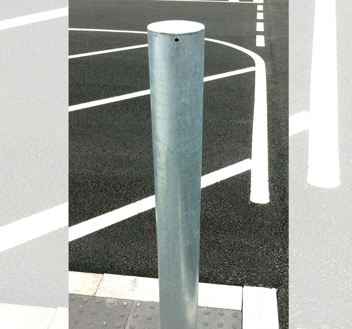 Stainless steel bollards installed in retail park